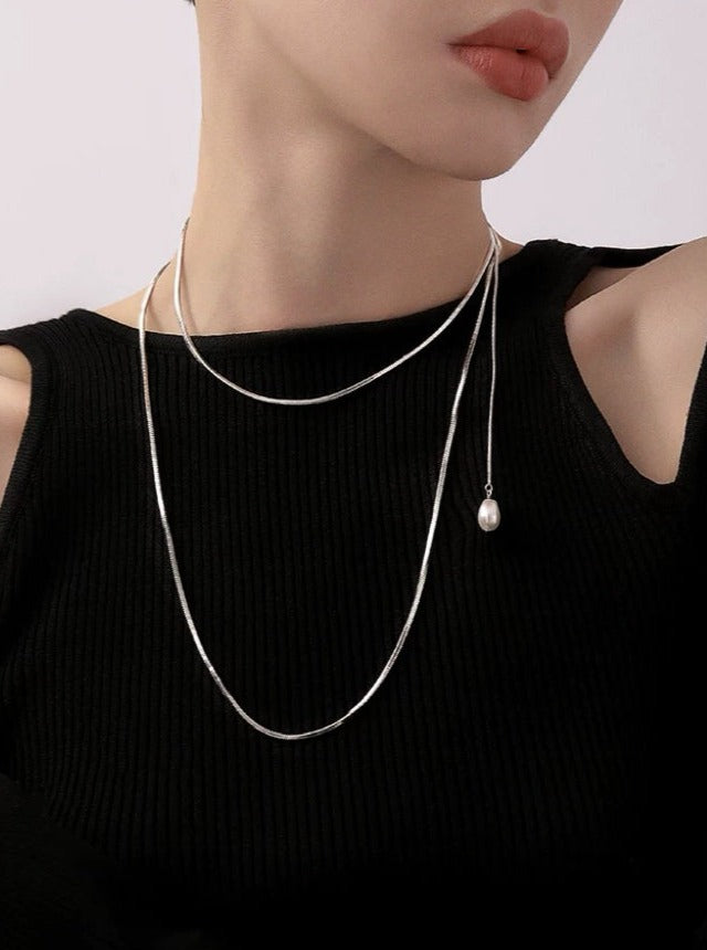 Elegance Unveiled: Multi-Layer Pearl Pendant Chain Necklace